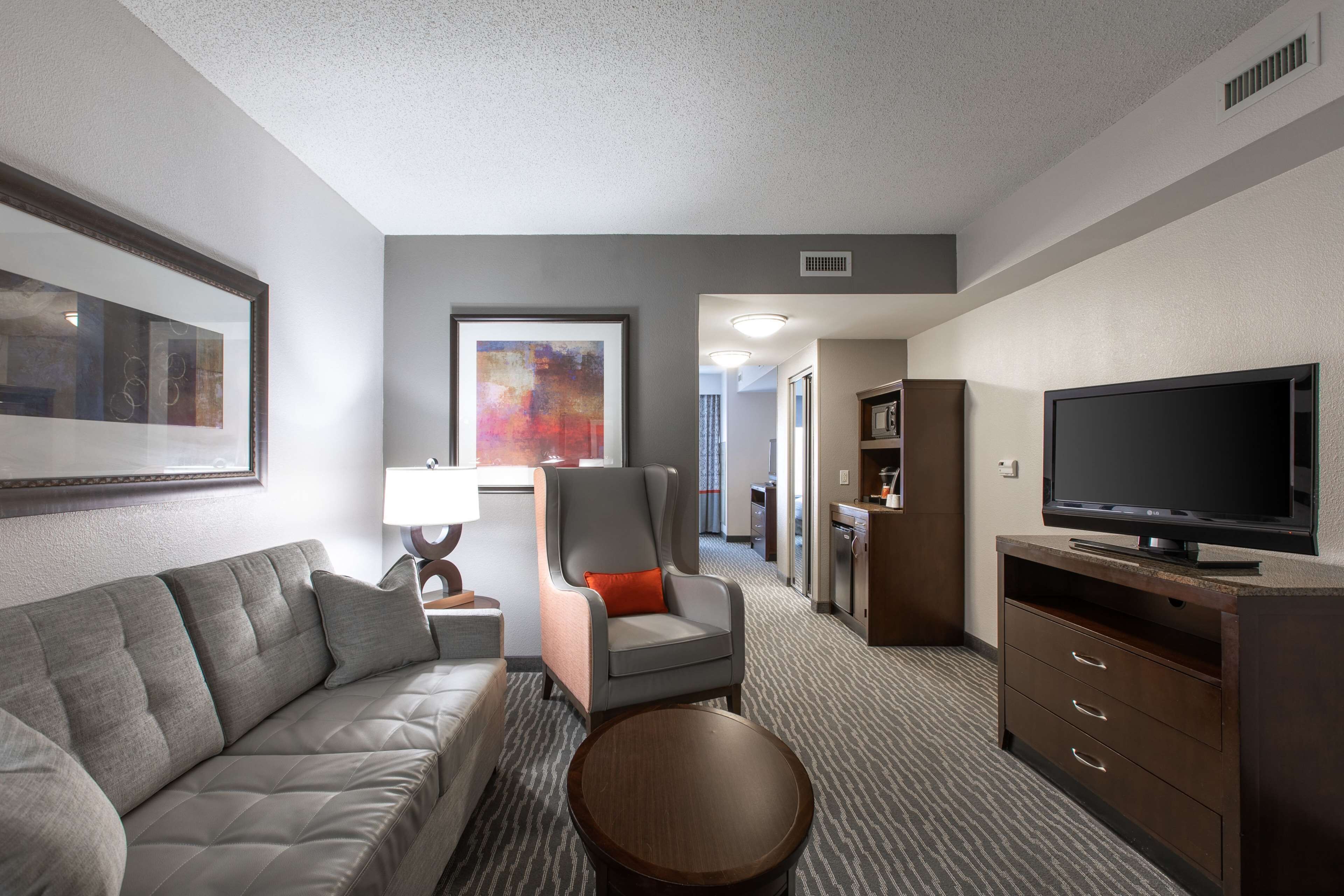 King, Junior Suite | Pillowtop beds, in-room safe, desk, iron/ironing board