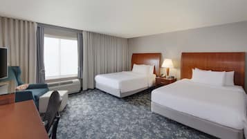 Hypo-allergenic bedding, desk, blackout drapes, iron/ironing board