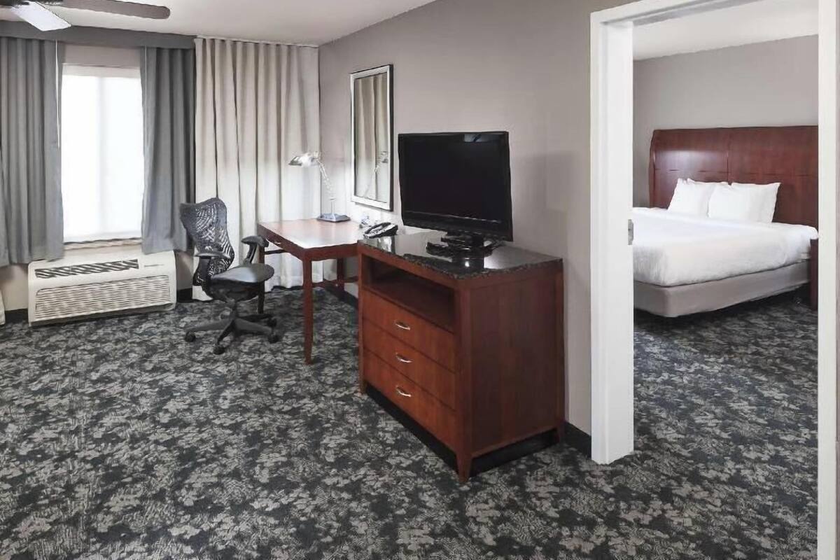 Hypo-allergenic bedding, desk, blackout drapes, iron/ironing board
