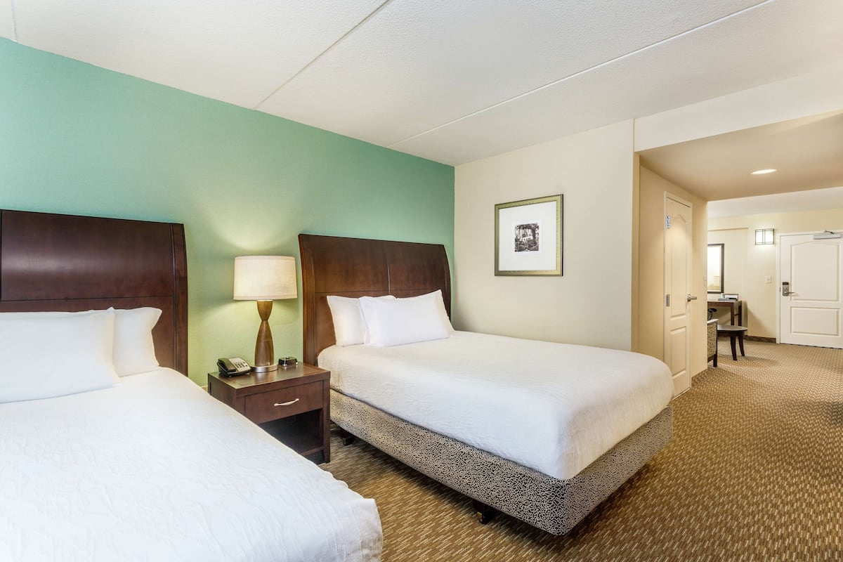 Suite, 2 Queen Beds | Hypo-allergenic bedding, desk, iron/ironing board, free rollaway beds