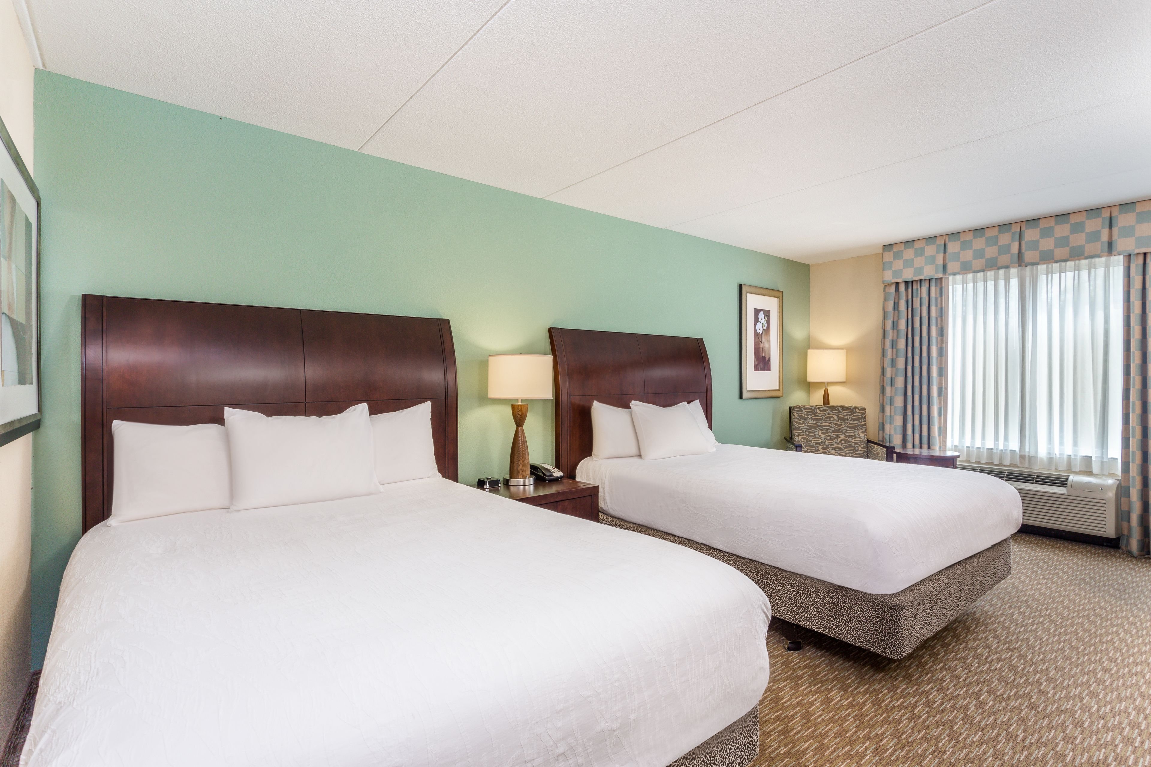 room, 2 queen beds | hypo-allergenic bedding, desk, iron/ironing board, free rollaway beds