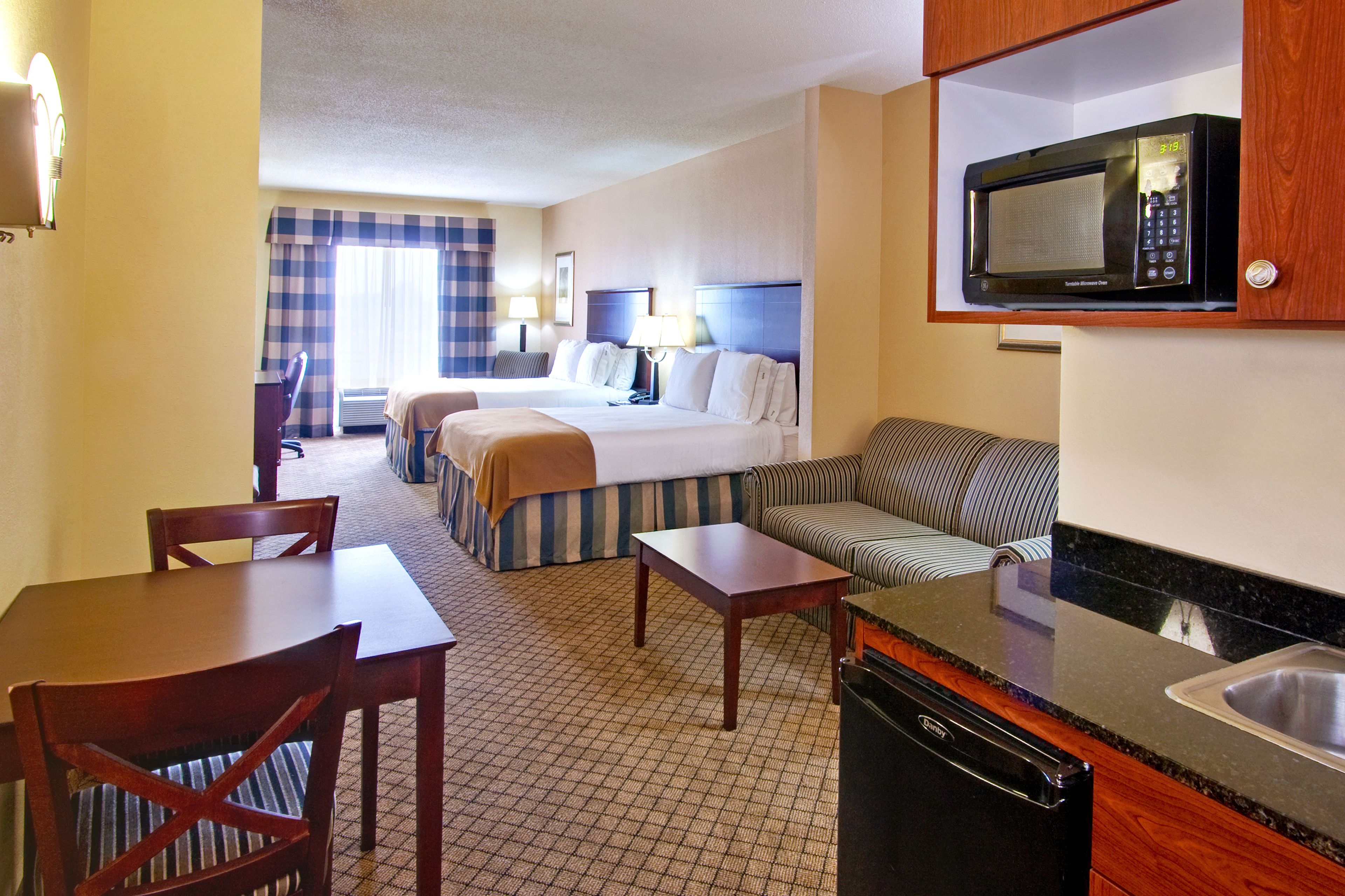 suite, multiple beds | in-room safe, desk, soundproofing, iron/ironing board