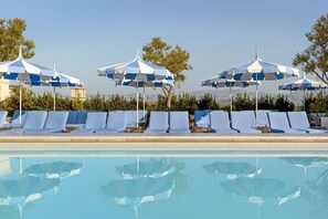 Outdoor pool, cabanas (surcharge), pool umbrellas