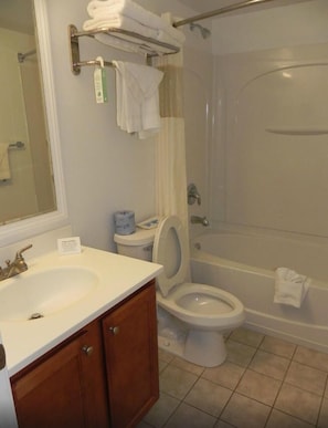 Standard Room, 2 Double Beds, Non Smoking | Bathroom | Combined shower/tub, hair dryer, towels
