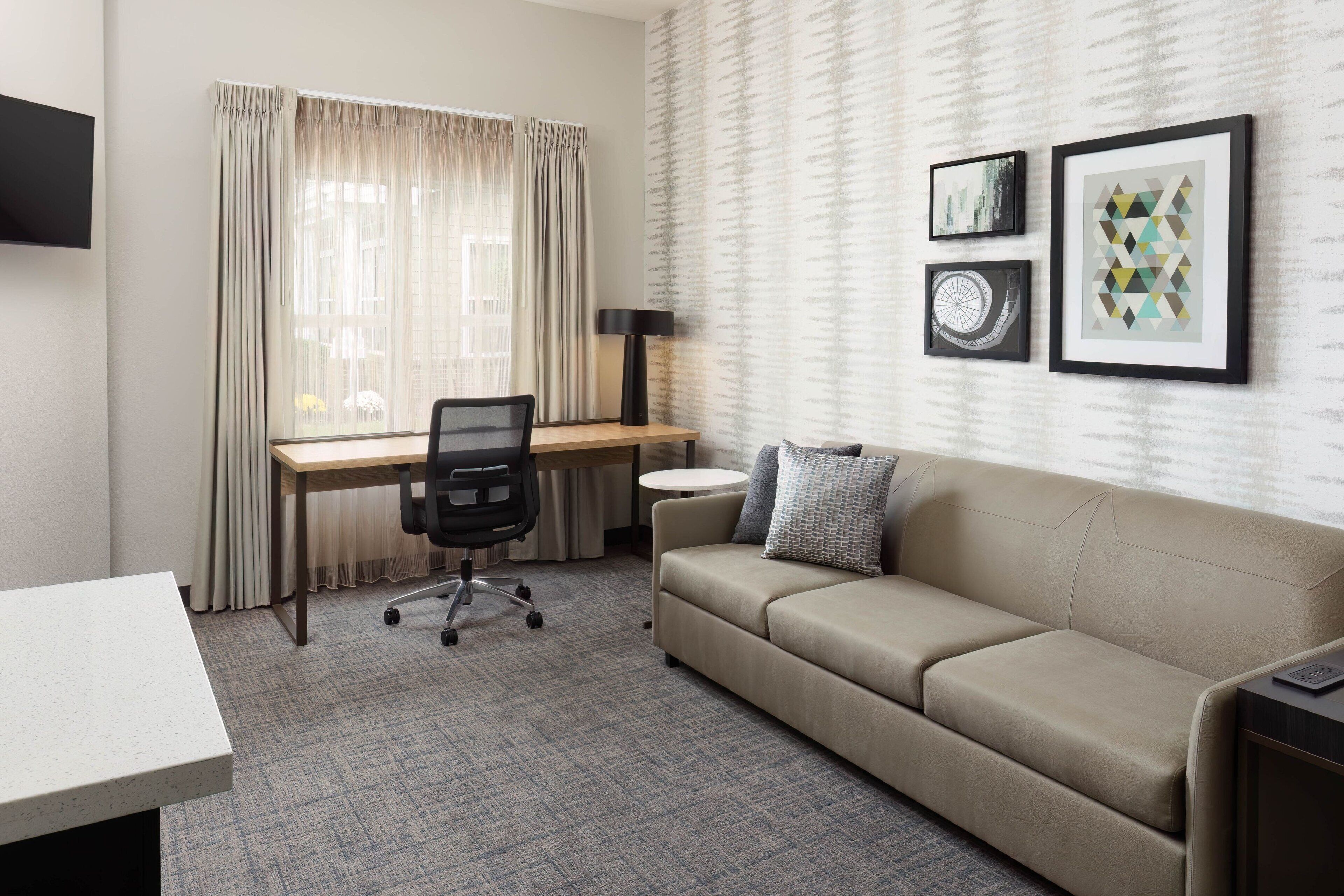 suite, 1 king bed with sofa bed, non smoking, corner | living area | tv