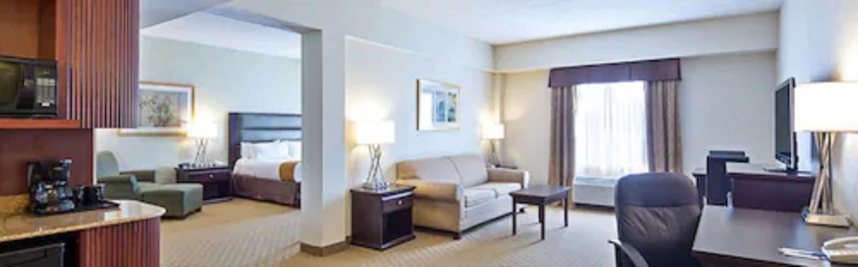 Desk, soundproofing, iron/ironing board, free cribs/infant beds