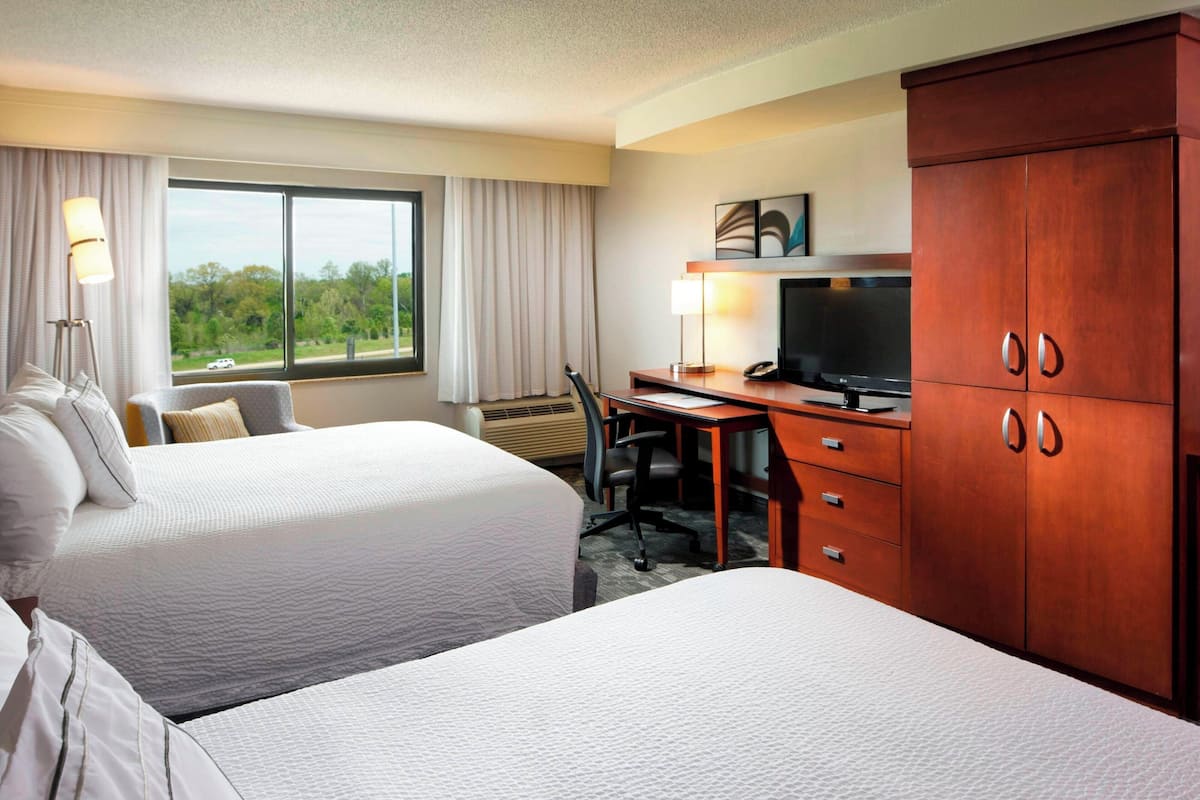 desk, blackout curtains, iron/ironing board, free cots/infant beds