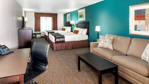 A hotel room with two beds, a sofa, a desk, and a telephone. - Wingate by Wyndham St. George (St. George)