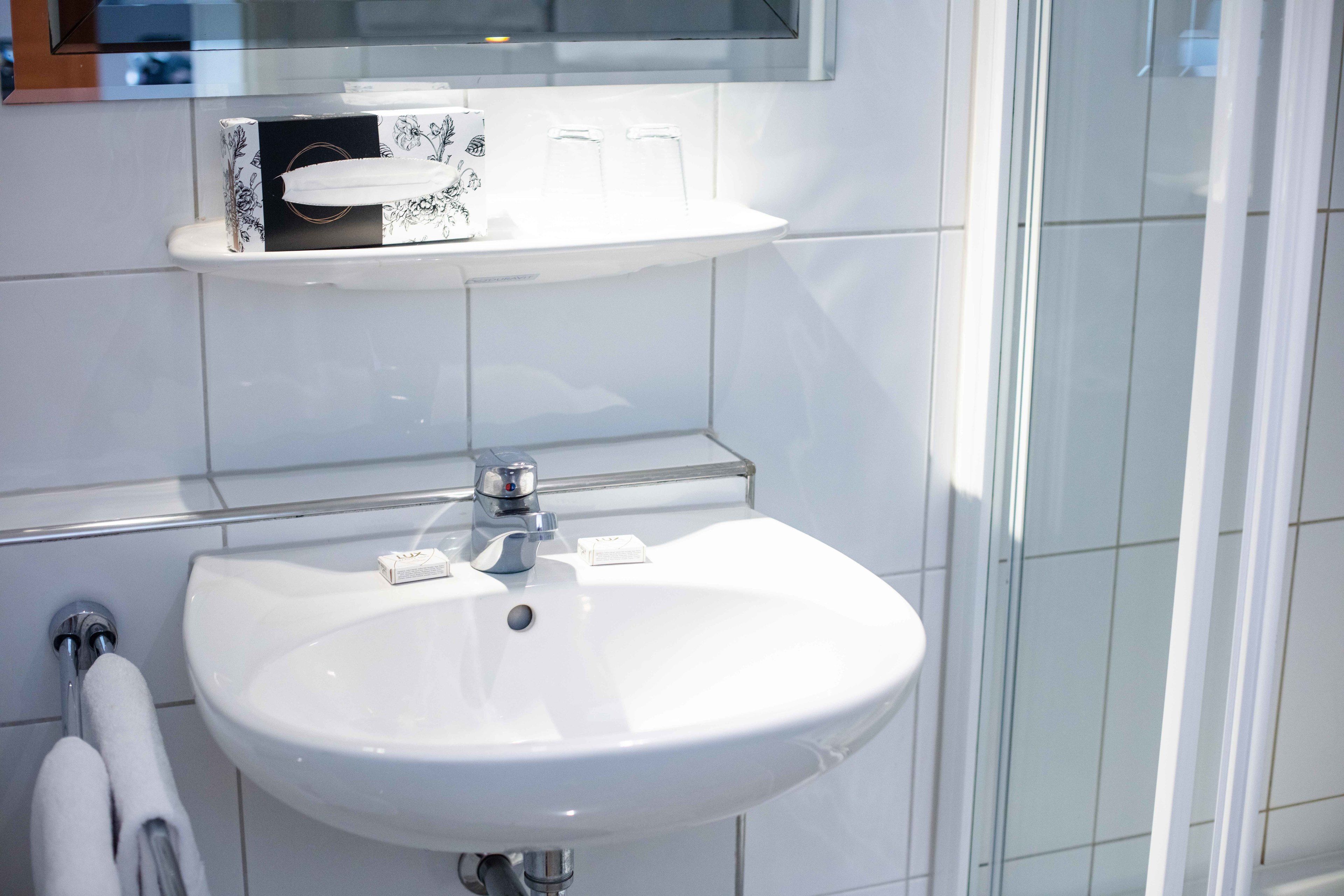 twin room | bathroom | free toiletries, hair dryer, towels