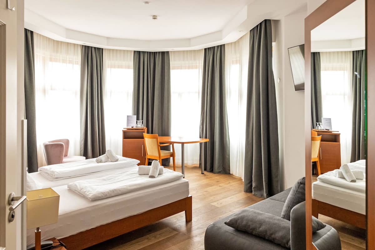 Family Quadruple Room | 1 bedroom, premium bedding, minibar, in-room safe