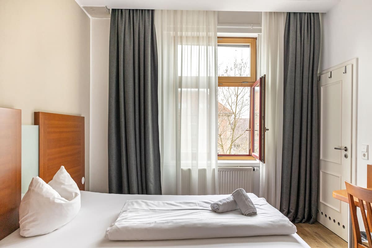 Single Room | 1 bedroom, premium bedding, minibar, in-room safe
