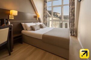 Desk, blackout drapes, soundproofing, free WiFi