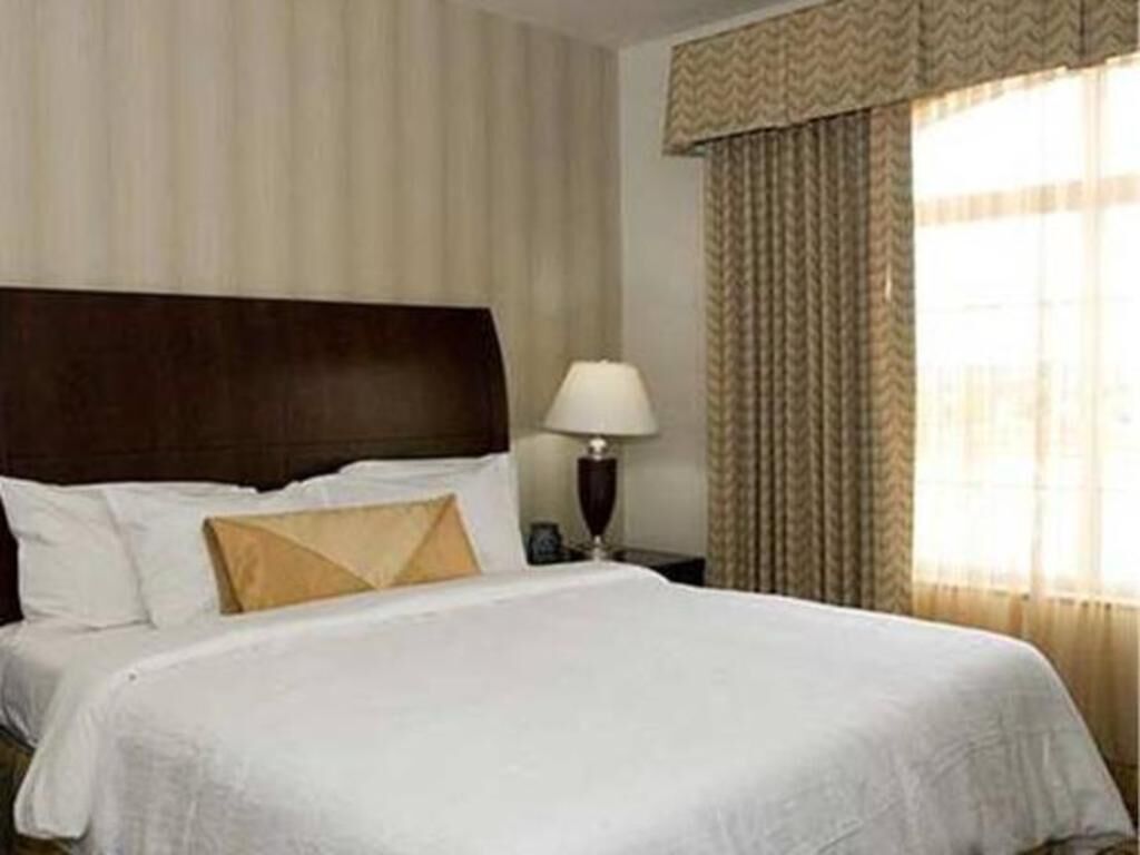 Premium bedding, down comforters, desk, laptop workspace