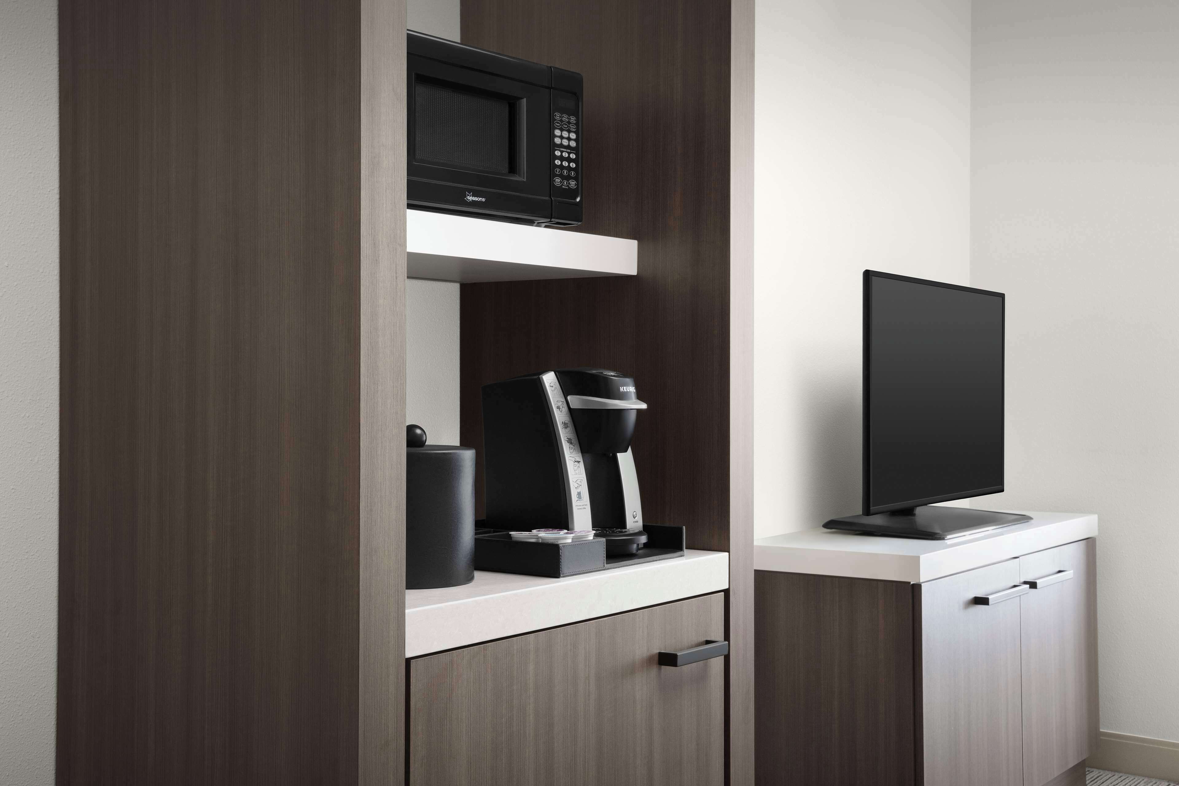 premium bedding, down duvets, desk, laptop workspace