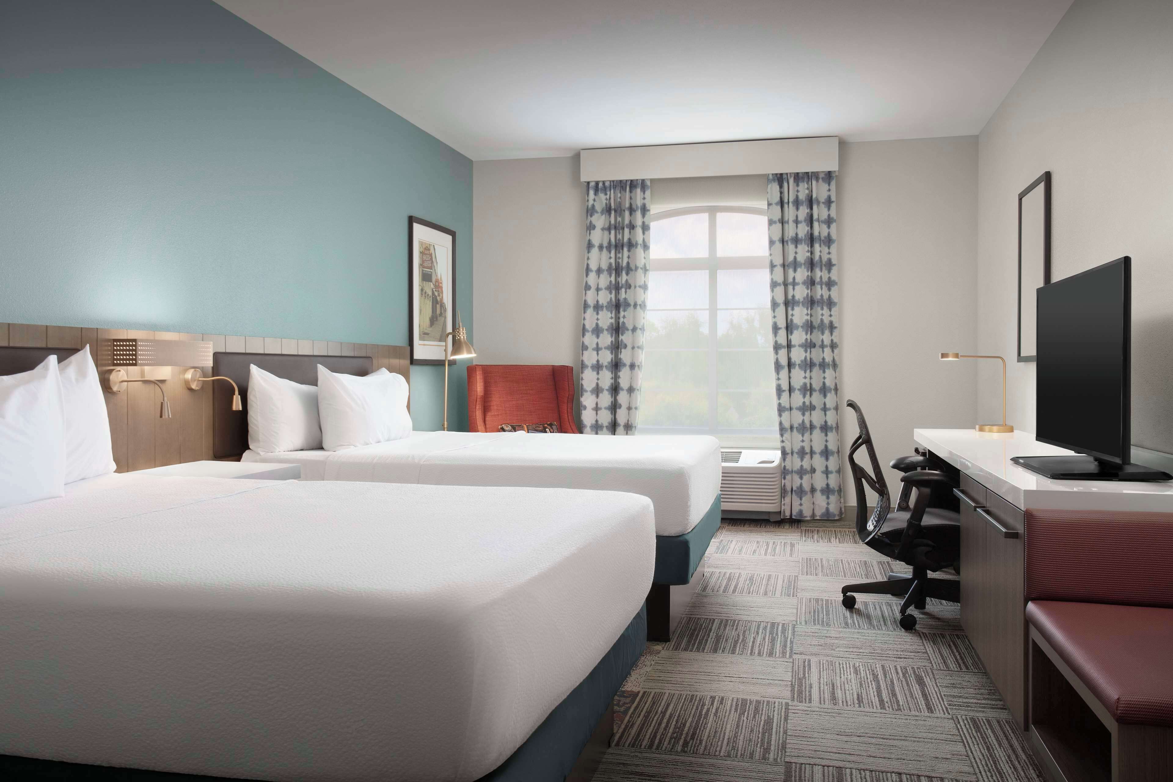 premium bedding, down duvets, desk, laptop workspace