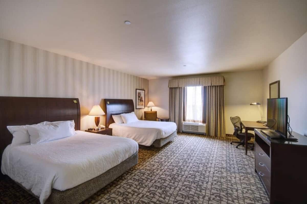 Premium bedding, down comforters, desk, laptop workspace