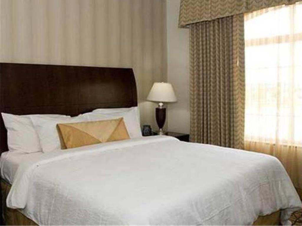 Premium bedding, down comforters, desk, laptop workspace