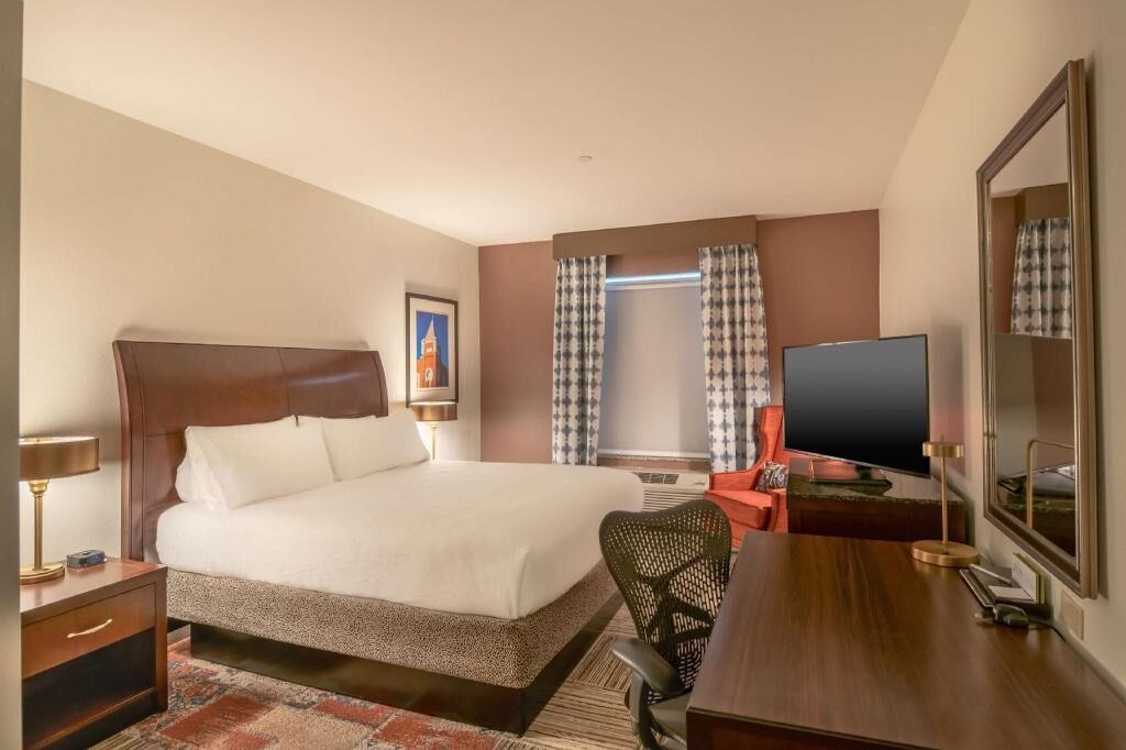 Premium bedding, down comforters, desk, laptop workspace