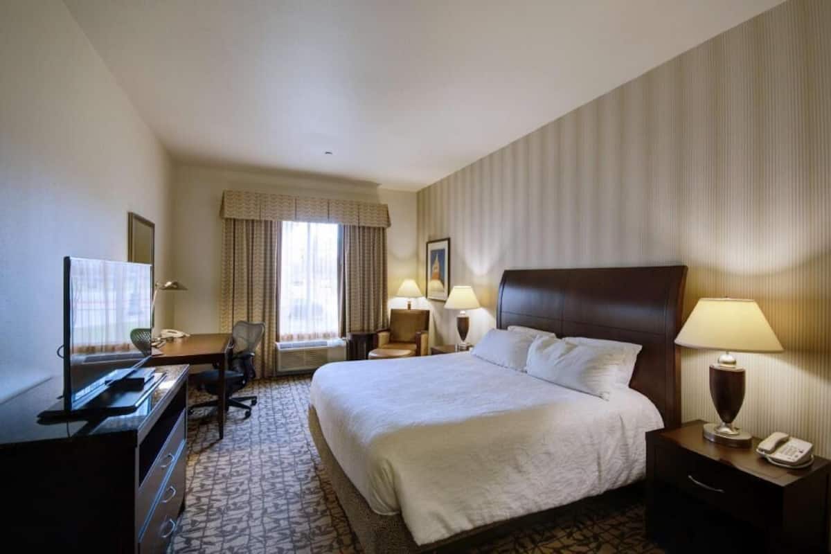 Premium bedding, down comforters, desk, laptop workspace