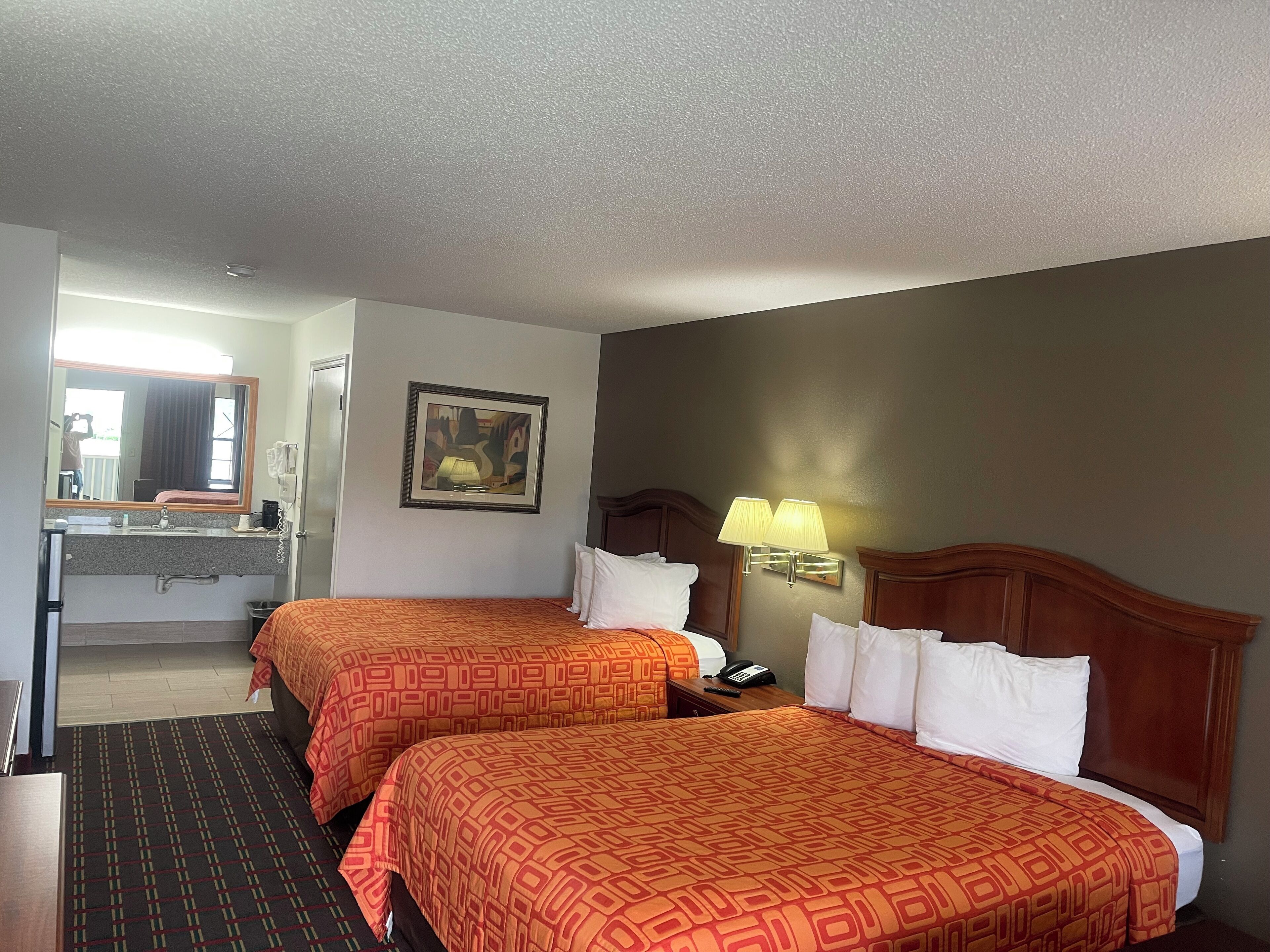 Blackout drapes, iron/ironing board, free WiFi, alarm clocks