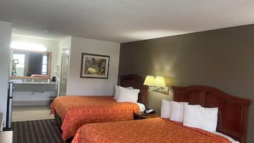 Blackout drapes, iron/ironing board, free WiFi, alarm clocks