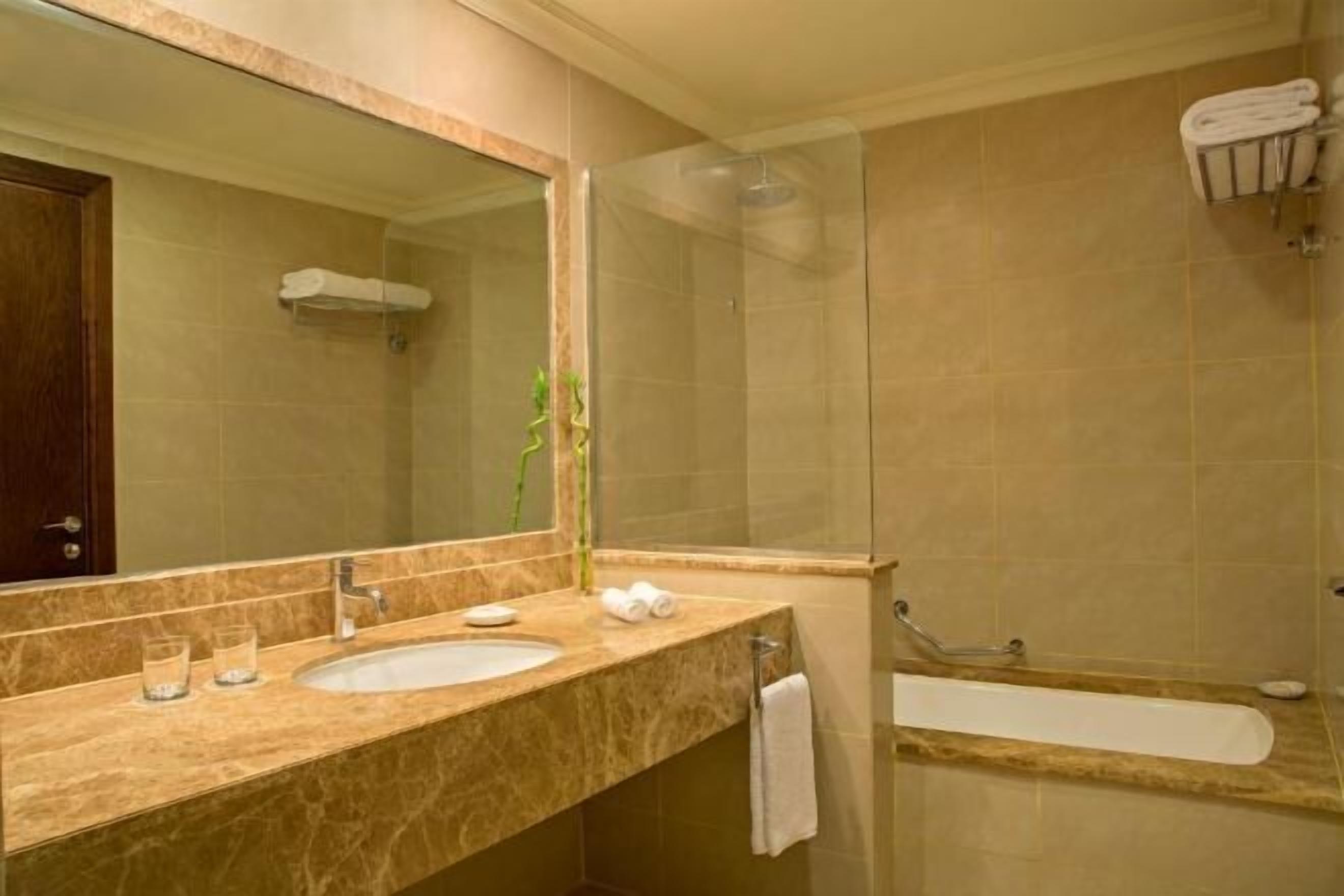 Bathtub, free toiletries, hair dryer, bathrobes