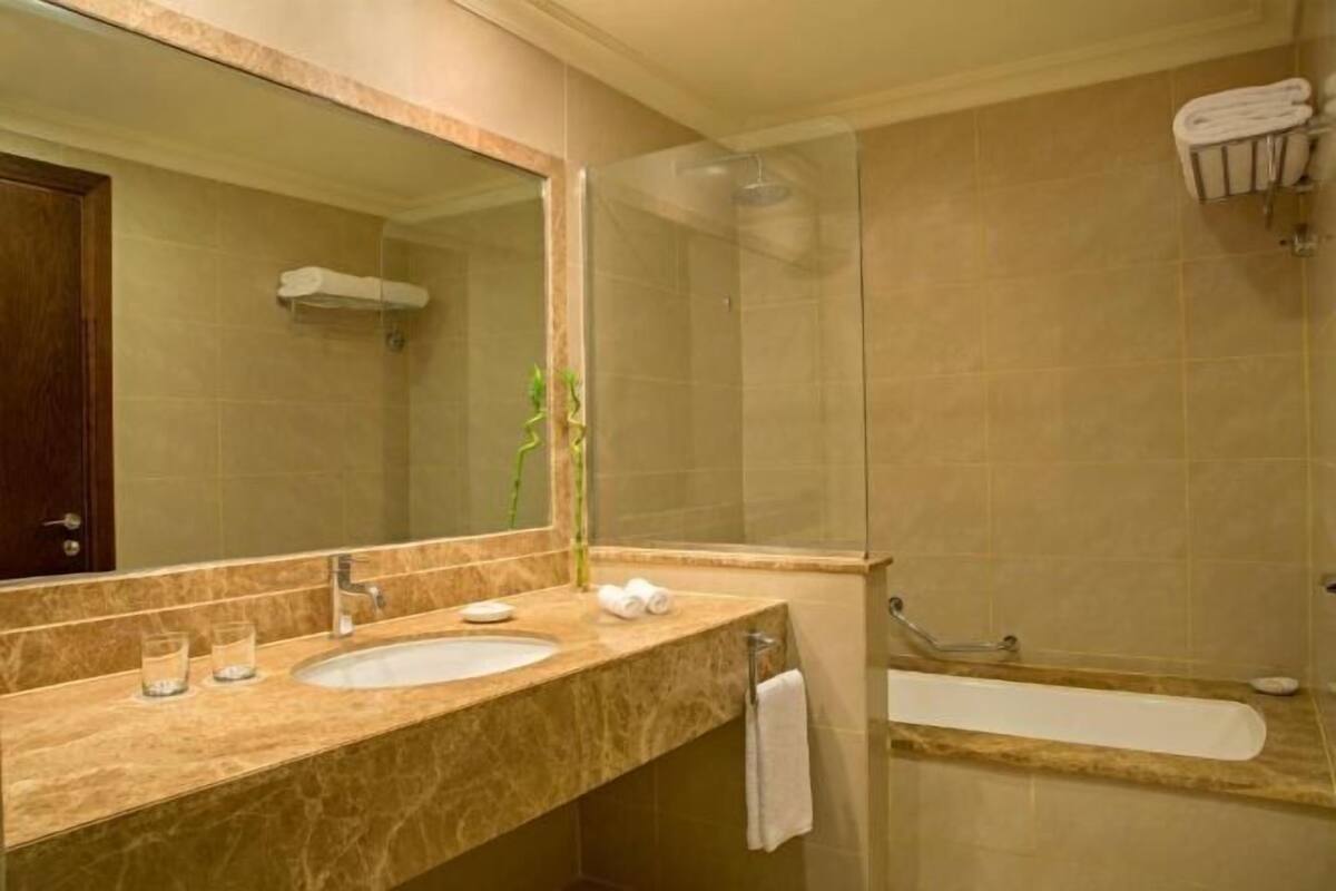 Bathtub, free toiletries, hair dryer, bathrobes