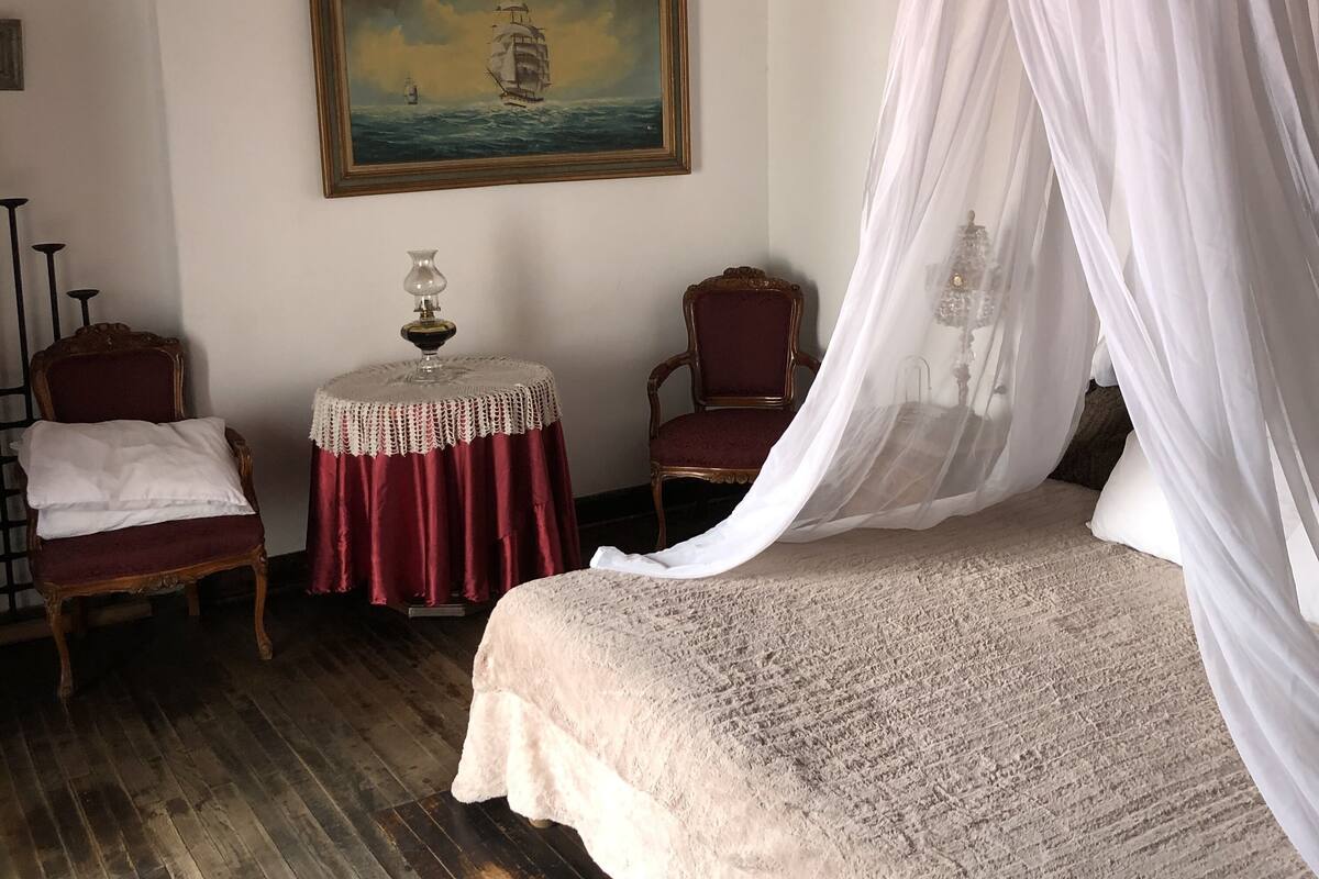 Superior Suite, 1 King Bed, Jetted Tub | Iron/ironing board (on request), WiFi (free), individually decorated