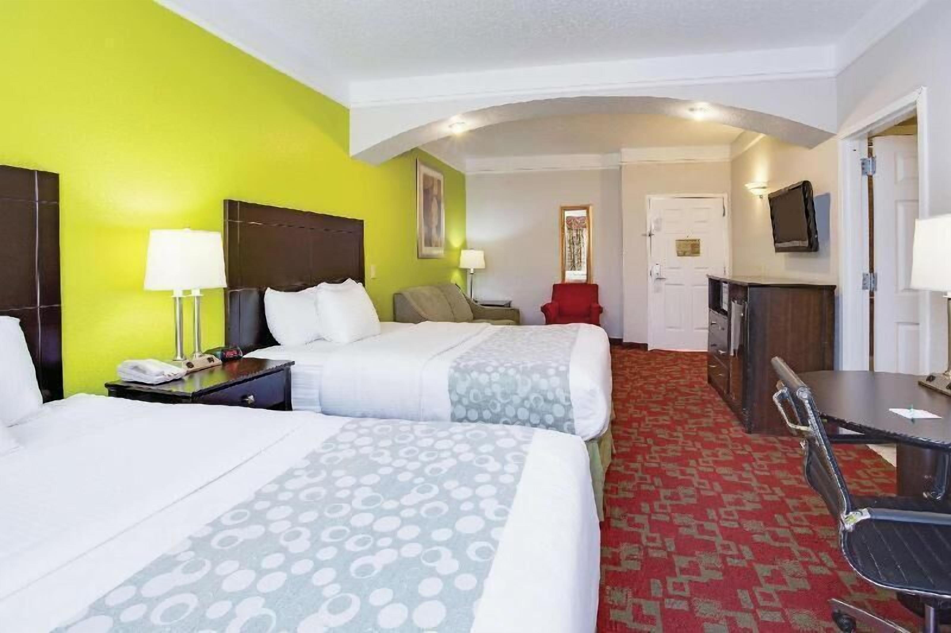 Premium bedding, desk, laptop workspace, iron/ironing board