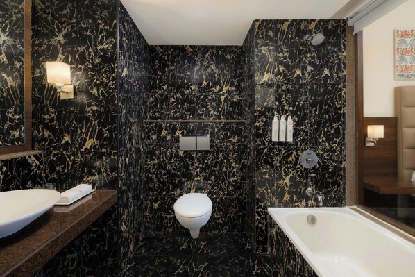 Executive Room, 1 King Bed, Non Smoking | Bathroom | Bathtub, eco-friendly toiletries, hair dryer, bathrobes