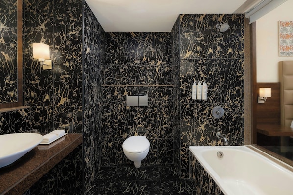 Executive Room, 1 King Bed, Non Smoking | Bathroom | Bathtub, eco-friendly toiletries, hair dryer, bathrobes