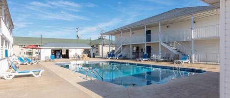 Outdoor pool, open 10:00 AM to 10:00 PM, sun loungers