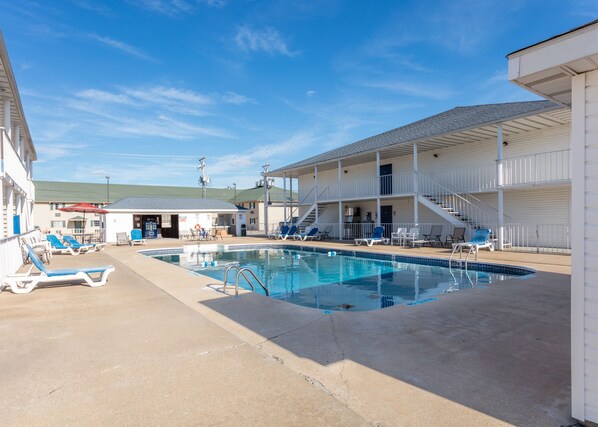 Outdoor pool, open 10:00 AM to 10:00 PM, sun loungers