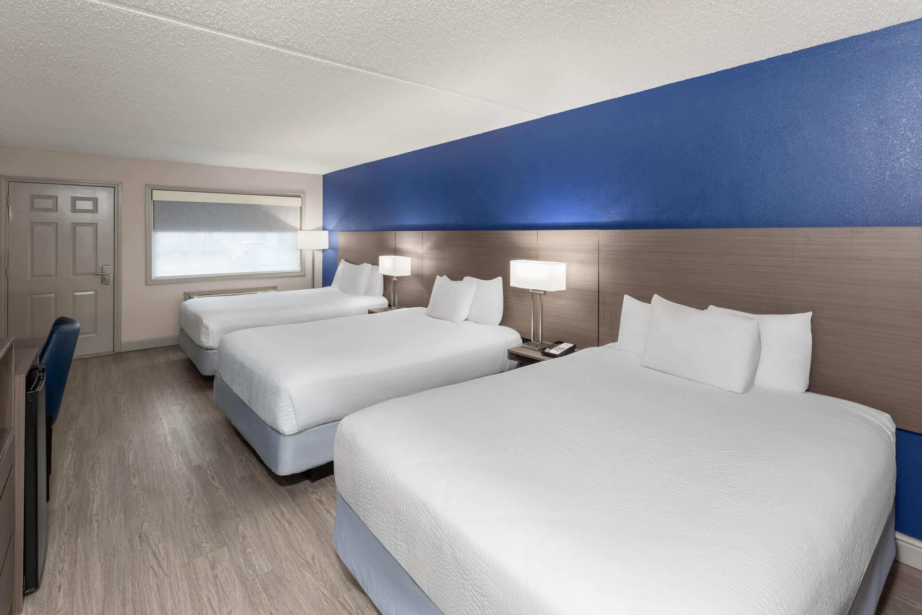 Room, Multiple Beds, Non Smoking | Premium bedding, pillowtop beds, desk, blackout drapes