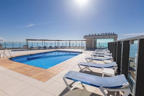 Outdoor pool, pool umbrellas, pool loungers