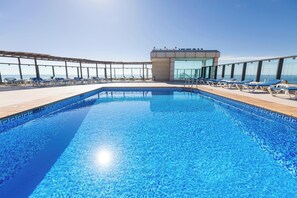 Outdoor pool, pool umbrellas, pool loungers