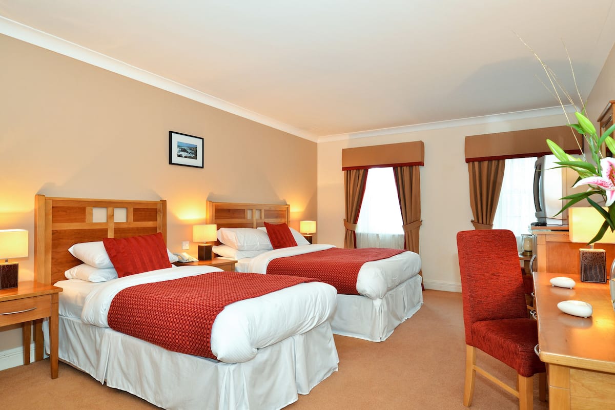 iron/ironing board, free cots/infant beds, rollaway beds, free wifi