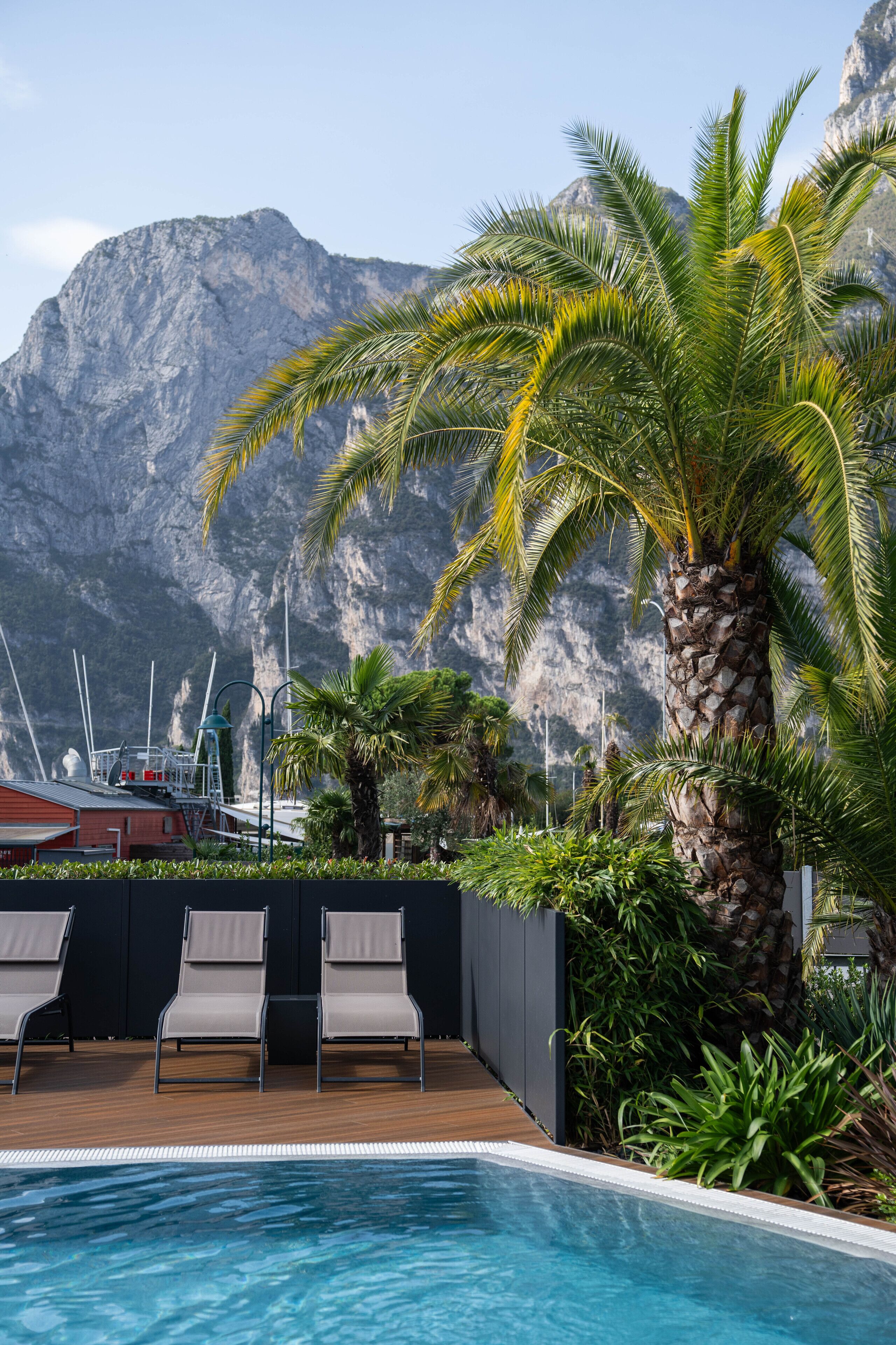 Seasonal outdoor pool, a heated pool, sun loungers