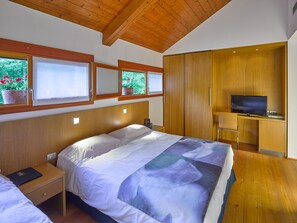 Apartament, vistes al jardí | Llençols italians de la marca Frette i roba de llit d'alta qualitat 