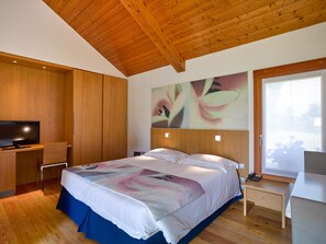 Habitación doble Deluxe | Sábanas italianas Frette y ropa de cama de alta calidad 