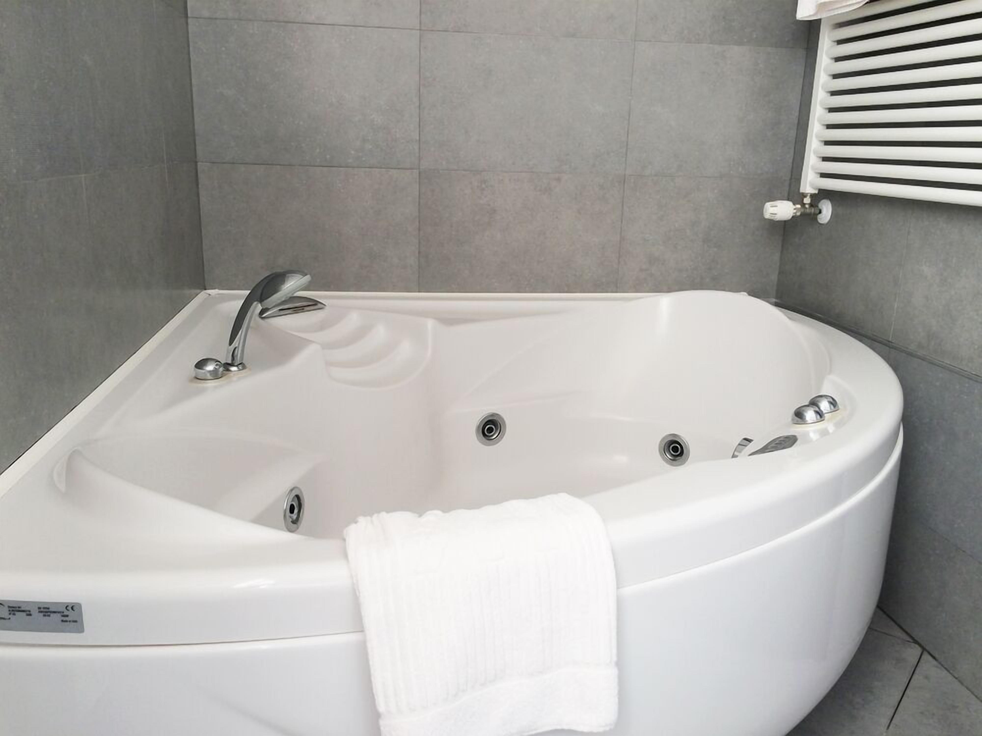 superior double room | bathroom | hair dryer, bidet, towels