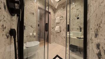 Shower, free toiletries, hair dryer, towels