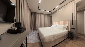 Premium bedding, down duvets, minibar, in-room safe