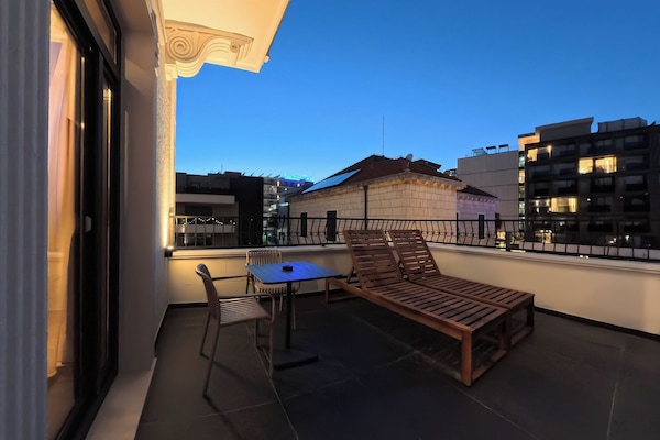 Deluxe-huone, parveke | Terassi/patio