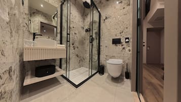 Shower, free toiletries, hair dryer, towels