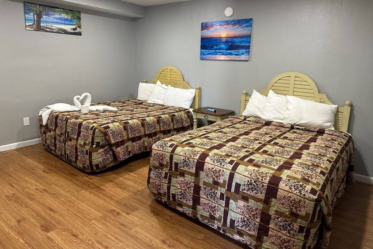 Standard Room, 2 Queen Beds | WiFi (free), alarm clocks, bed sheets