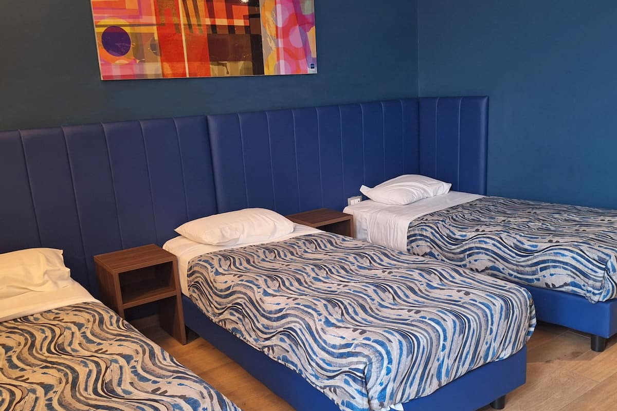 Triple Room | Down comforters, minibar, in-room safe, desk