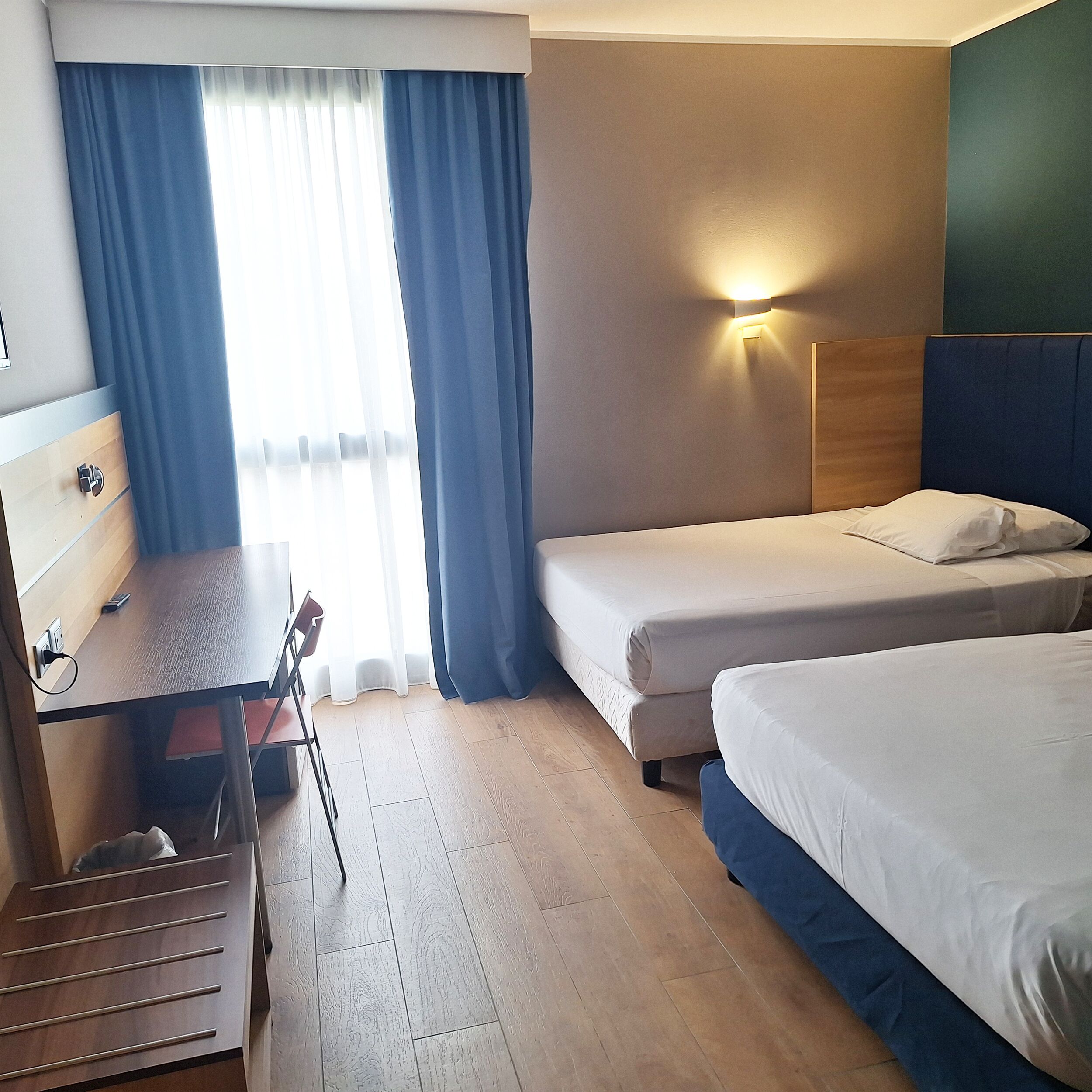 Quadruple Room | Down comforters, minibar, in-room safe, desk