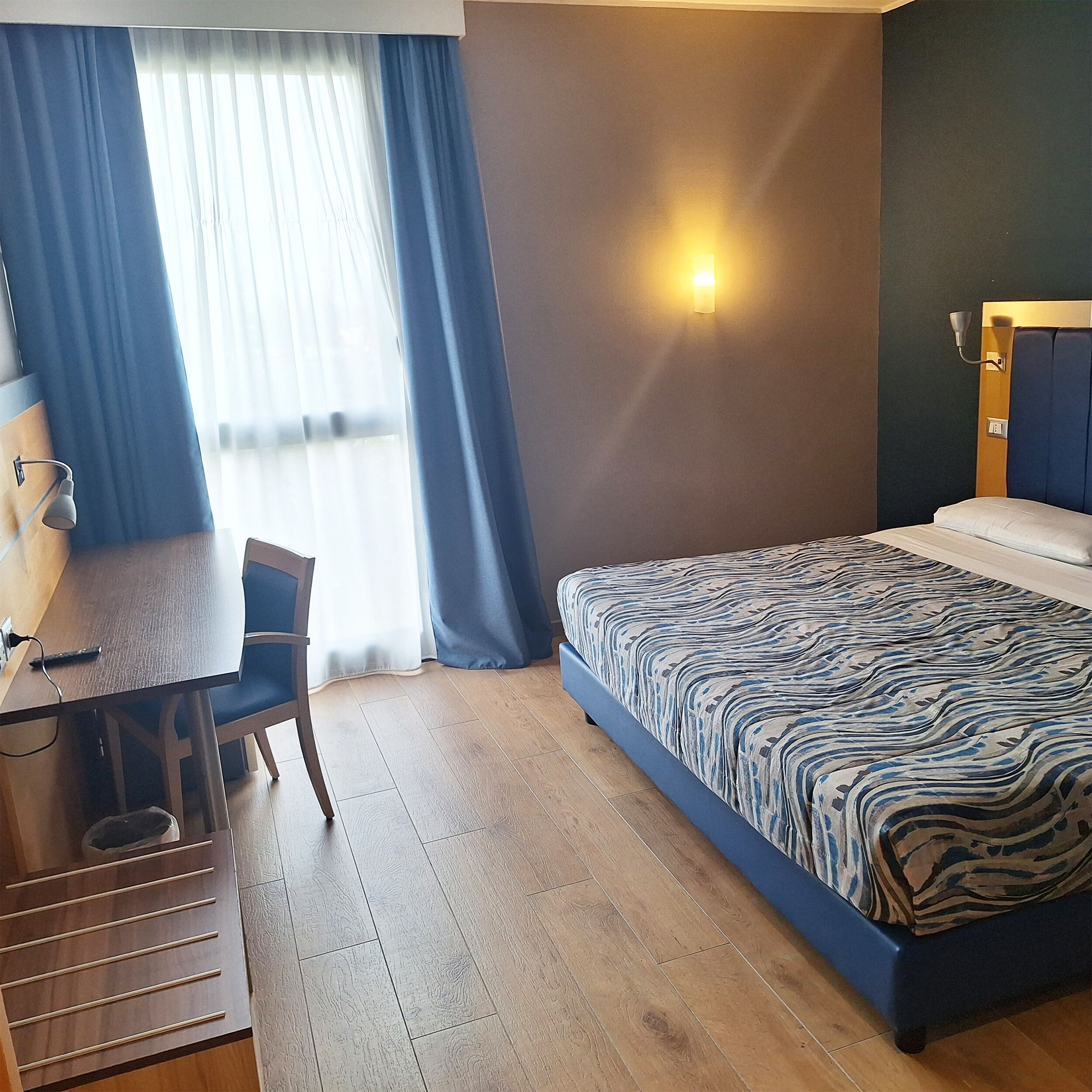 Down comforters, minibar, in-room safe, desk