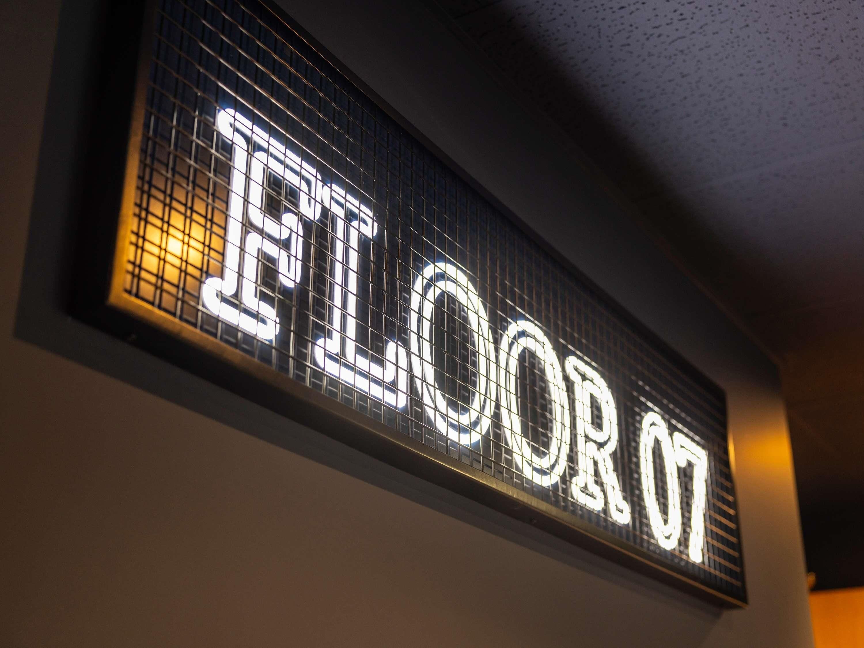A digital sign indicating "Floor 07" in a hotel or similar establishment.